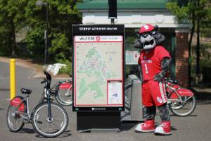 Wolfie in front of campus bike rentals